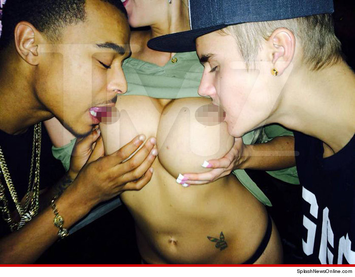 Justin Bieber mamando pezones