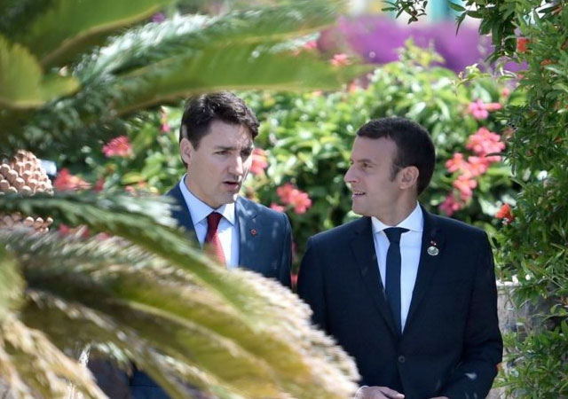 Justin Trudeau y Emmanuel Macron se fotografían juntos y se hacen virales