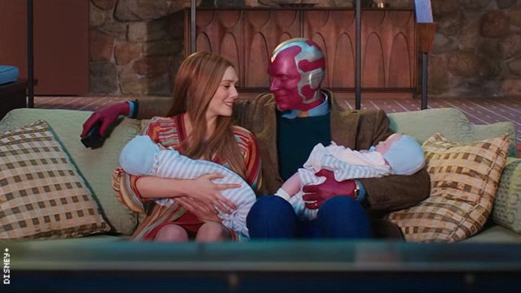 Wanda Maximoff and Vision holding their twin sons
