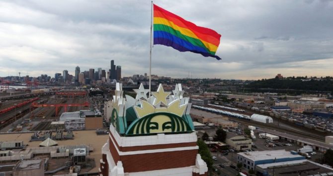 Starbucks headquarters in Seattle fly a giant rainbow flag during Pride month in 2018