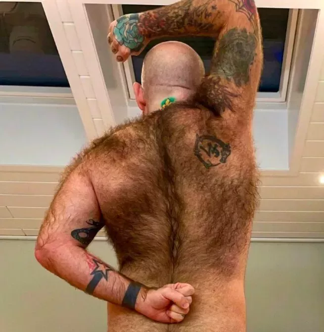 A man with a very hairy back