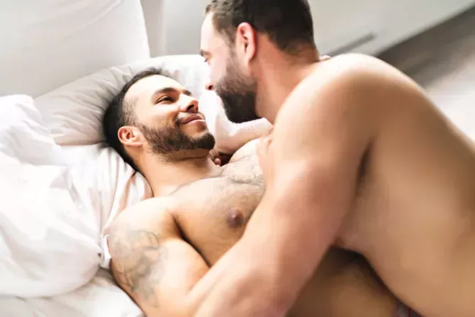Gay couple in bed