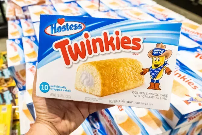 Shoppers hand holding a package of Twinkies