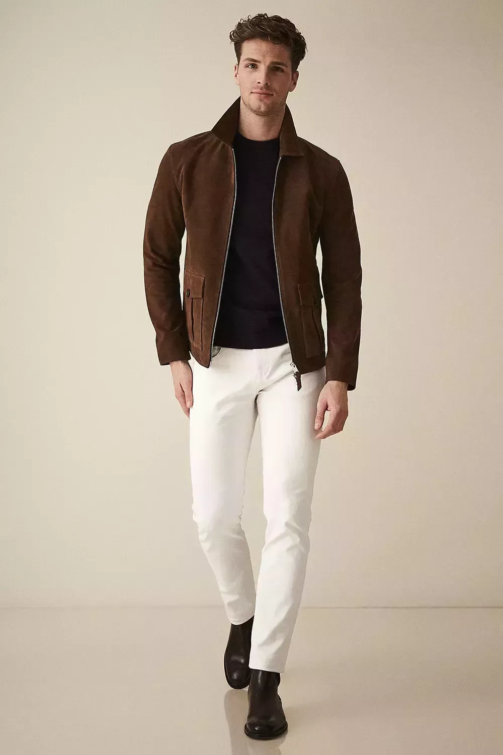 Las mejores formas de llevar botas con vaqueros: Conjuntos elegantes para hombres