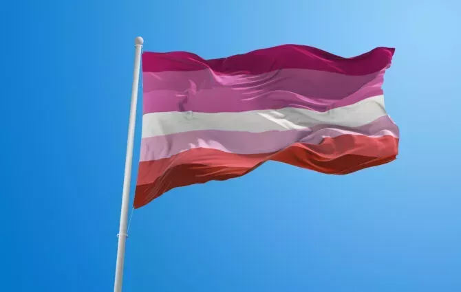 Large flag of Lesbian Pride waving in the wind
