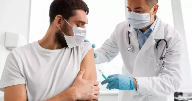 A man receives the monkeypox vaccine