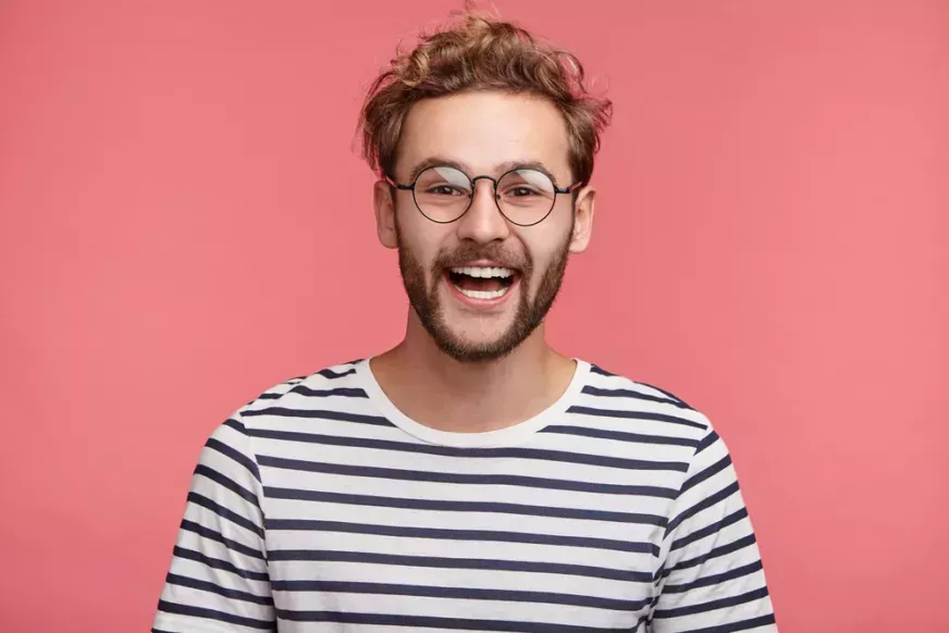 Laughing man with striped shirt