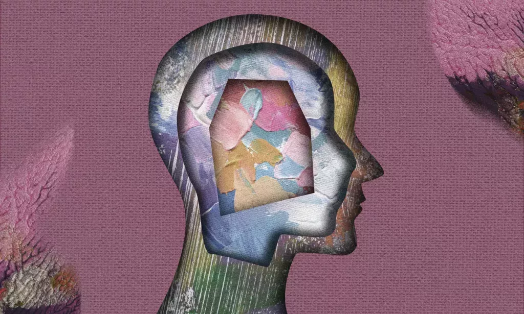 An illustration showing the outline of a person's head, with paint splodges inside