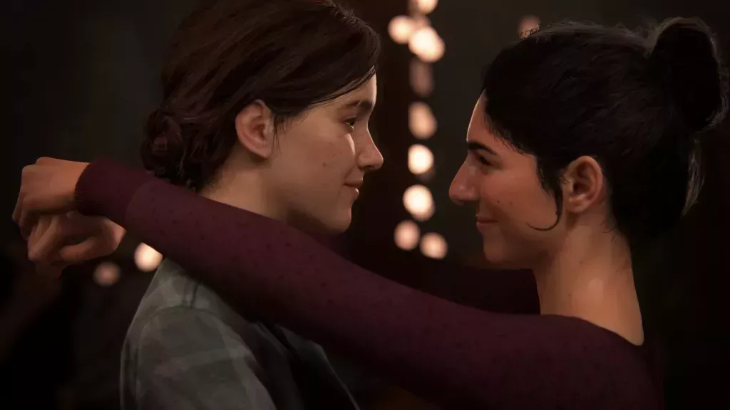 Ellie (left) and Dina dancing in The Last of Us: Part Two