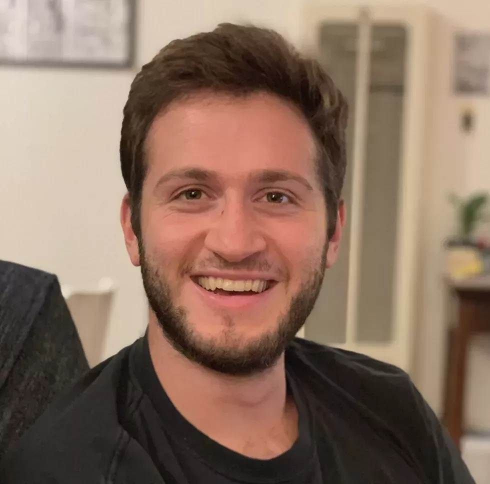 Filmmaker Corey Sherman smiling.