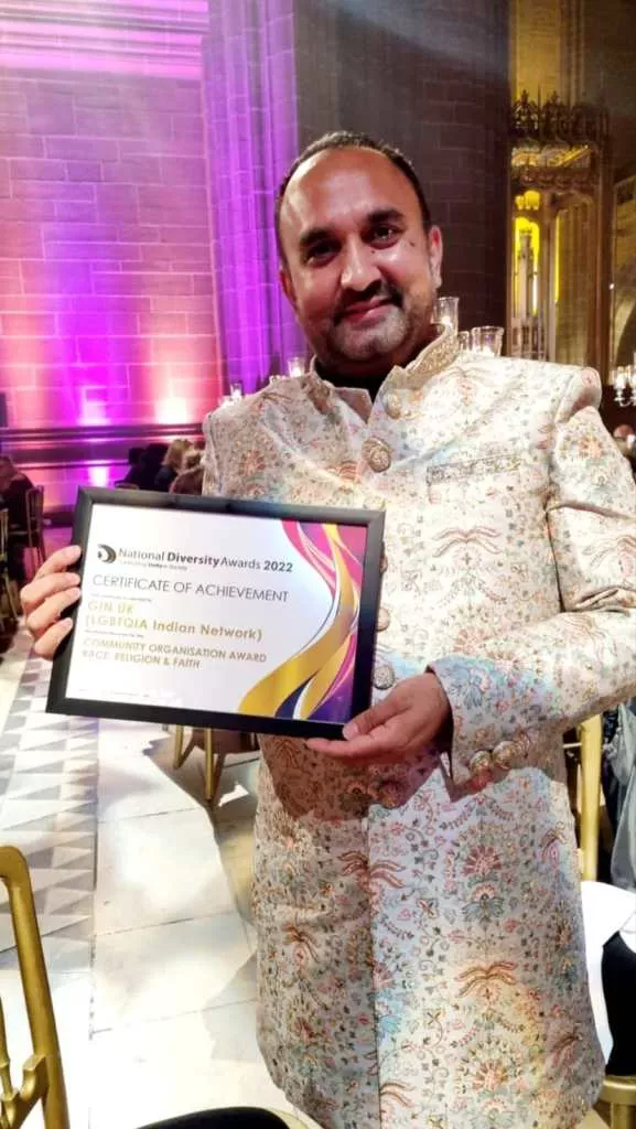 Mayank Joshi pictured receiving an award. 