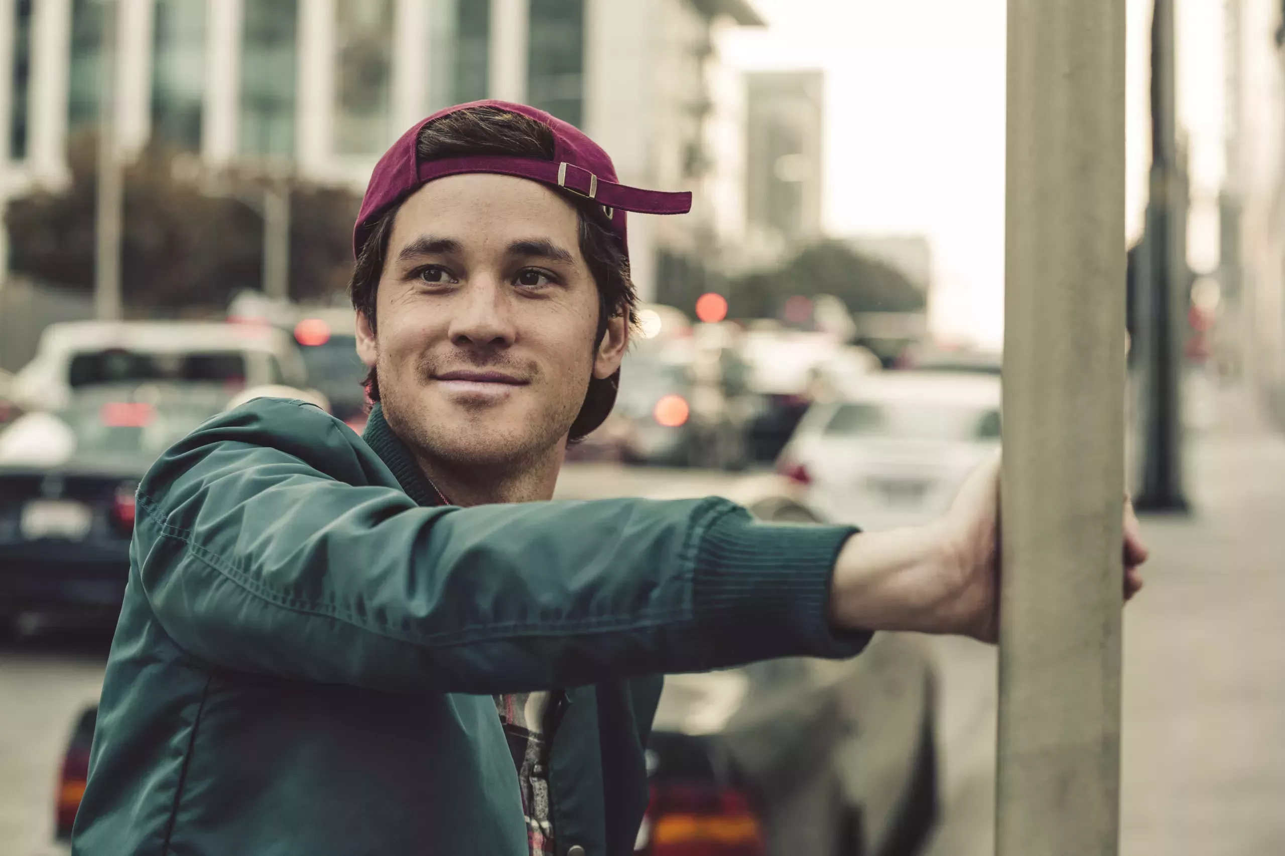 Portrait of smiling young man in the city