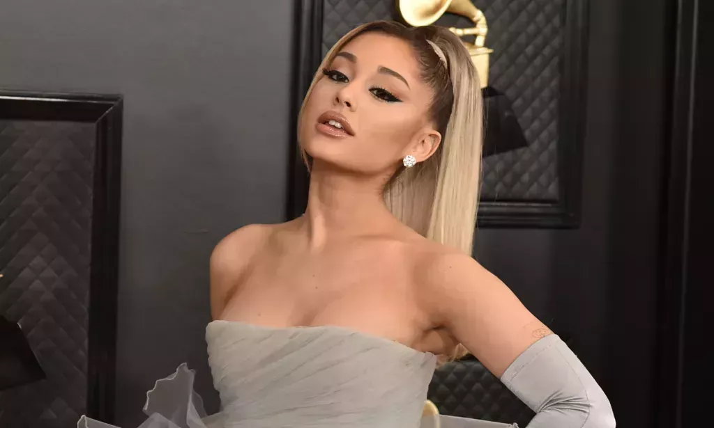 Ariana Grande teases fans.
