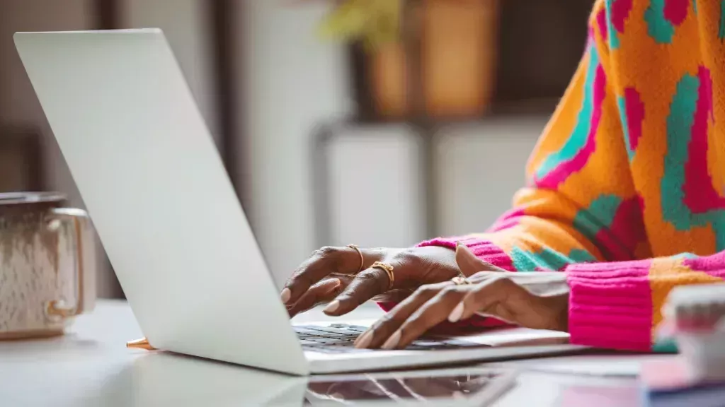 Stock image of a person using a laptop