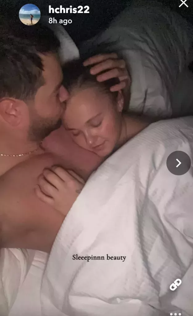 Chris Hughes snuggles Jojo Siwa. (Snapchat/Chris Hughes)